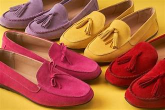 different colored flat shoes
